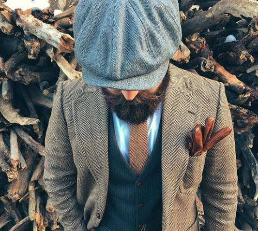 Winter fashion guide - a stylish man standing in an autumn woodland