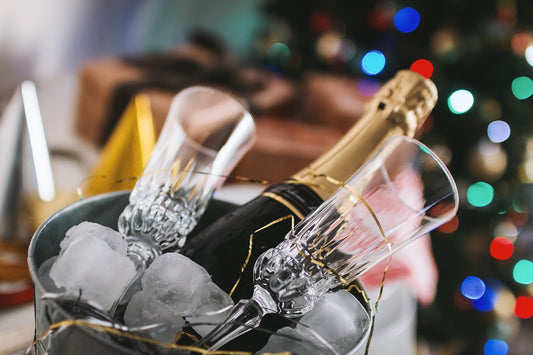 champagne on ice in a bucket at an office christmas party