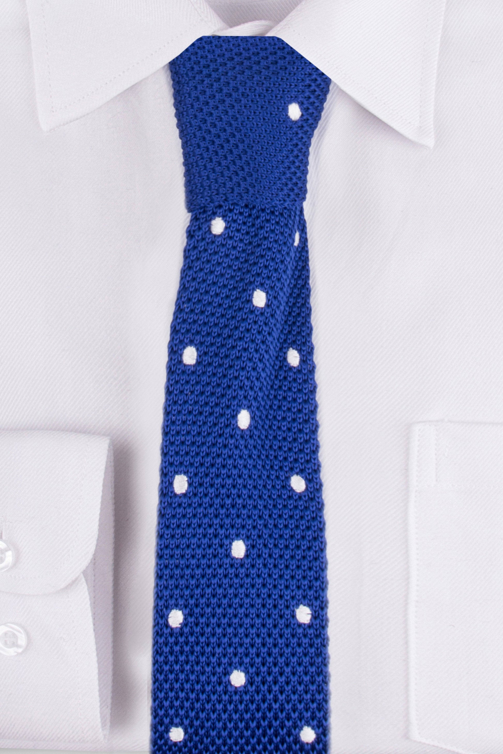 Close up of Royal Blue White Spot Knitted Tie on a white shirt