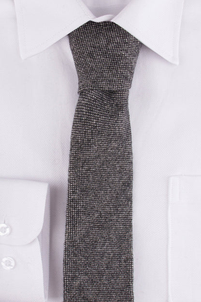 Close up of Classic Grey Barleycorn Tweed Tie on a wedding shirt